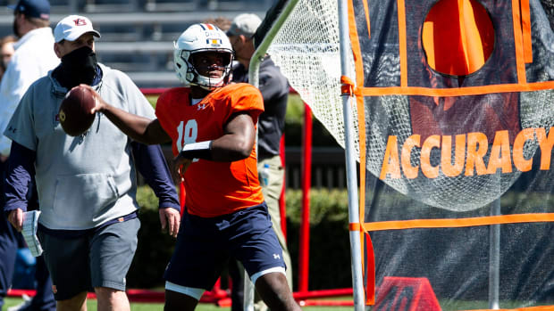 Auburn quarterback Dematrius Davis (18) runs drills during an open football practice at Jordan-Hare Stadium in Auburn, Ala., on Saturday, March 20, 2021.